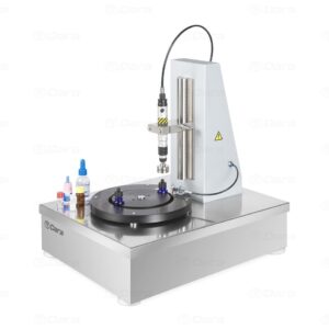 Tabletop machine for automatic closing of vials and bottles