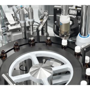 Rotary filling and closing machines for eye drops and nasal sprays