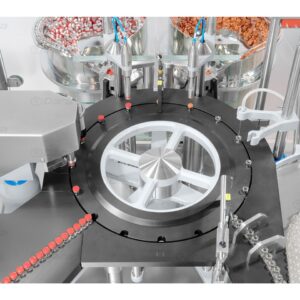 Rotary filling and closing machines for vials