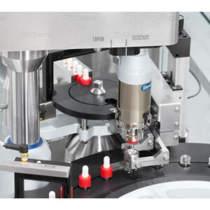 Rotary filling and closing for bottles